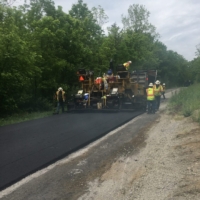 Luckily the construction workers allowed me to pass by while they were re-paving the road. The new pavement sizzled and was sticky underfoot.