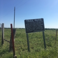 Trail Ruts | ".7 of a mile south of this sign are 20 foot wide swales made from thousands of wagons that traveled the Santa Fe Trail"
