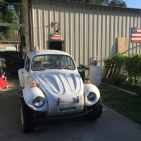 Robert's white buggy he traded a refurbished meat smoker for