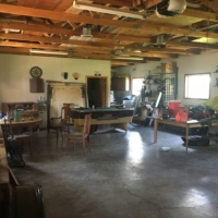 My host's garage-there's a guestroom in the back I get to call home for the night!