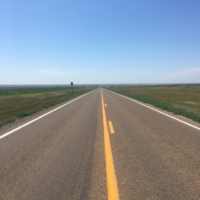 RT. 40. (Okay, this photo is a bit deceiving because RT. 40 out of Oakley, Kansas, is NOT empty. In fact, I had to wait for a break in traffic to run into the road to snap this photo while praying I don't die being an idiot.)