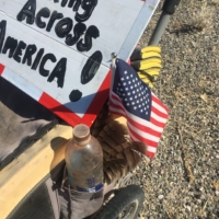 Picked up an American flag I found on the side of the road to accompany my water bottle and great horned owl feathers