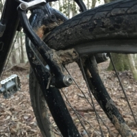 The mud caking Sal's front wheel after last nights foray.