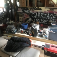My hosts for the night have a makeshift building, a shed of sorts, that they call "The Carriage House." I lie my bedroll down there.