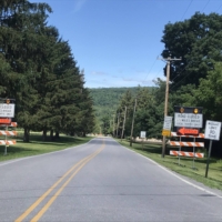 We hit a dead end. A bridge is out beside a monastery. I'm undeterred.